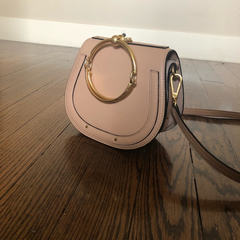 Women crossbody bag with copper ring nude color